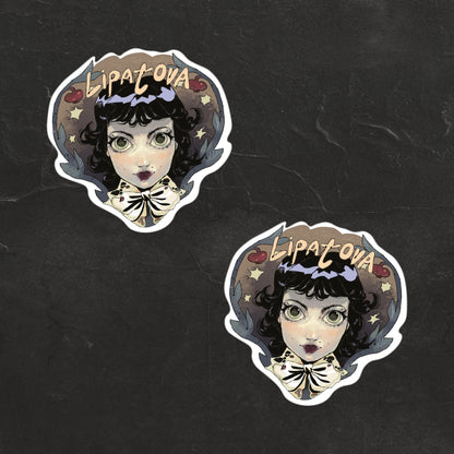 Стікер Lipatova на поверхні